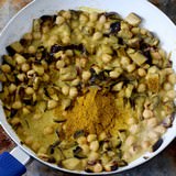 Vegan chickpea curry with eggplant, canned chickpeas, coconut milk, and Indian spices