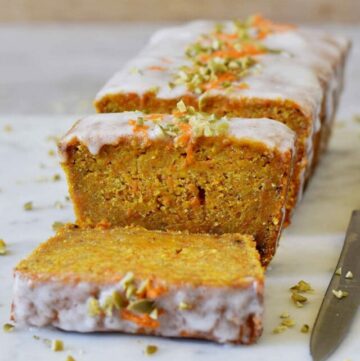 moist vegan carrot cake loaf with sugar-free icing