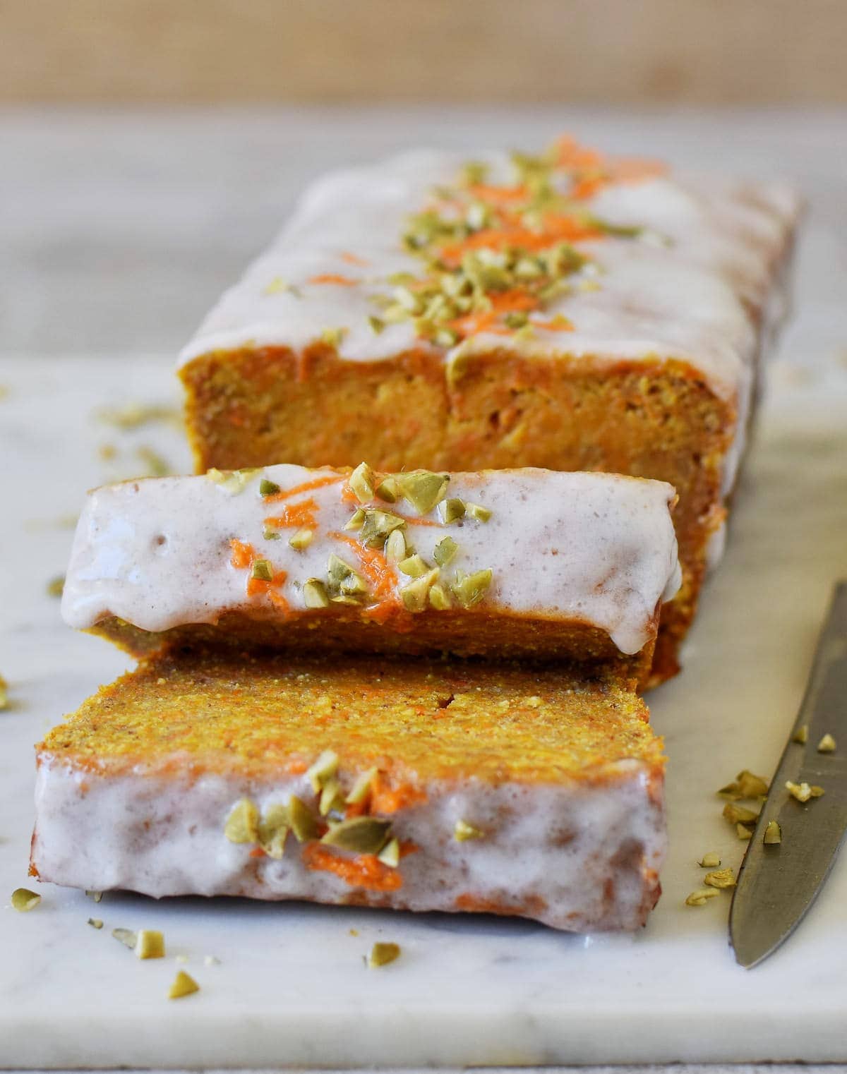 moist gluten-free carrot cake with vegan icing