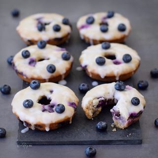 Baked blueberry donuts with a sugar free lemon glaze. These blueberry donuts are vegan, gluten free, refined sugar free, low in fat, healthy and delicious. Easy to make recipe!