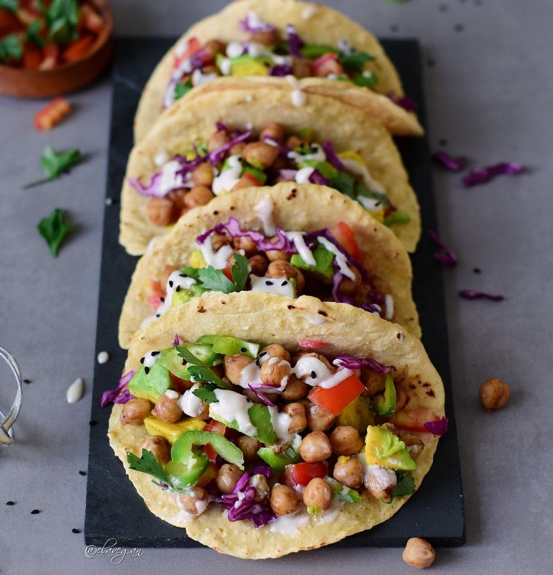 Chickpea tacos with avocado, veggies, and a tahini dressing