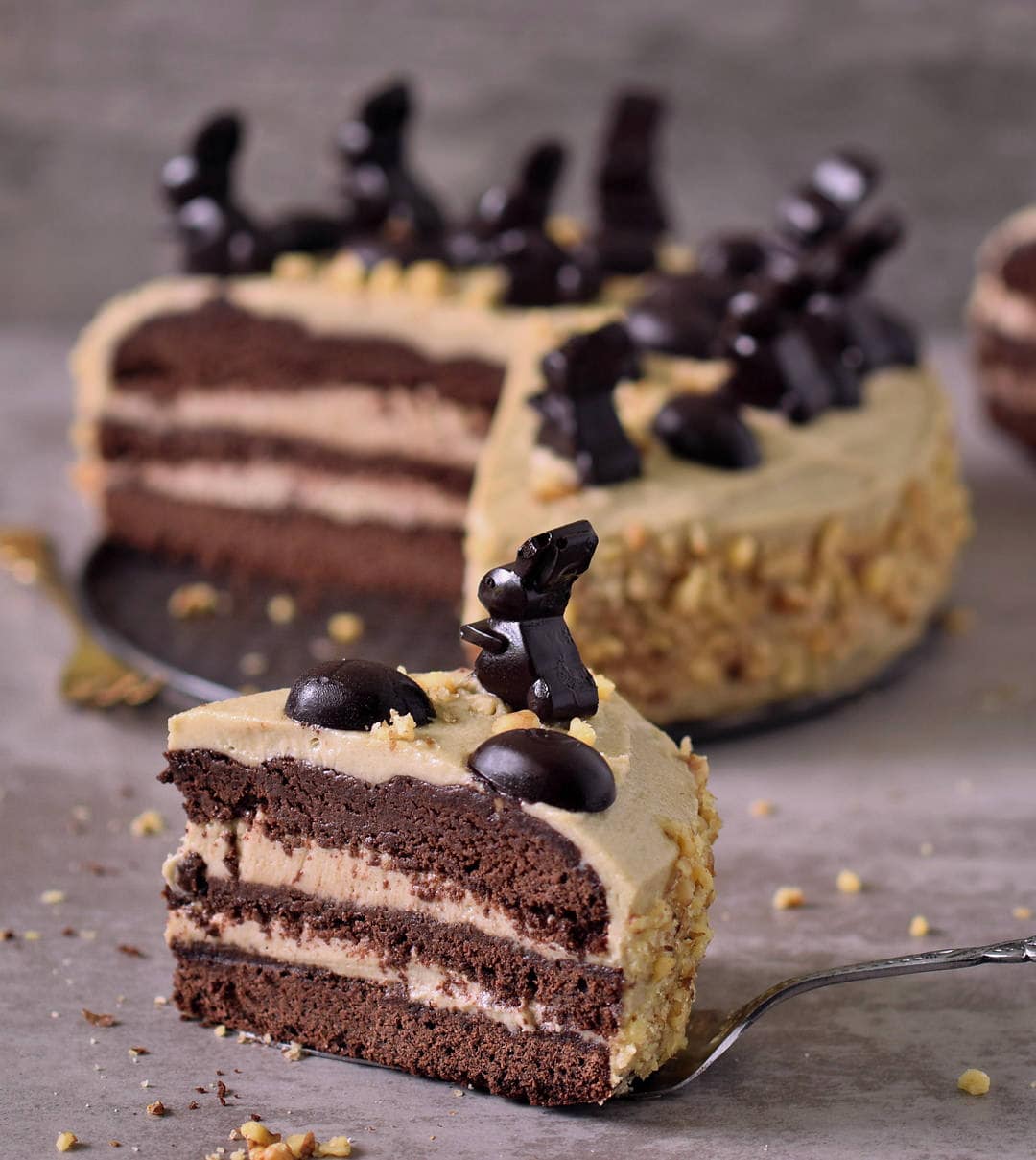 Peanut butter chocolate cake with a piece cut out