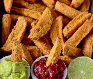 These crispy oven-baked vegan parmesan potato wedges are 100% plant-based, gluten-free, easy to make and flavorful. They are a great side dish, snack or appetizer. Enjoy with ketchup, guac, or mayo