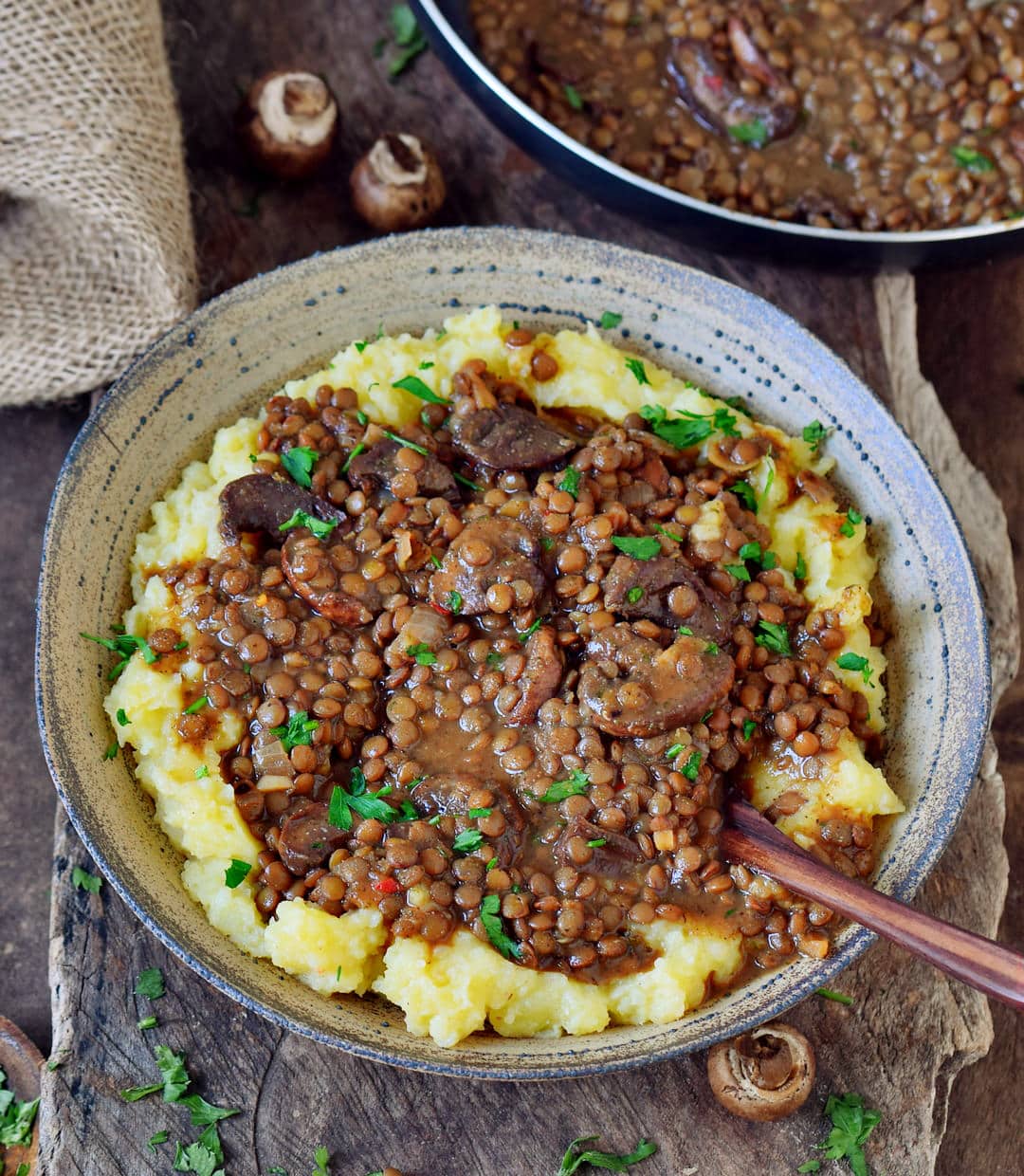 Easy lentil stew with mashed potatoes and mushrooms in a bowl