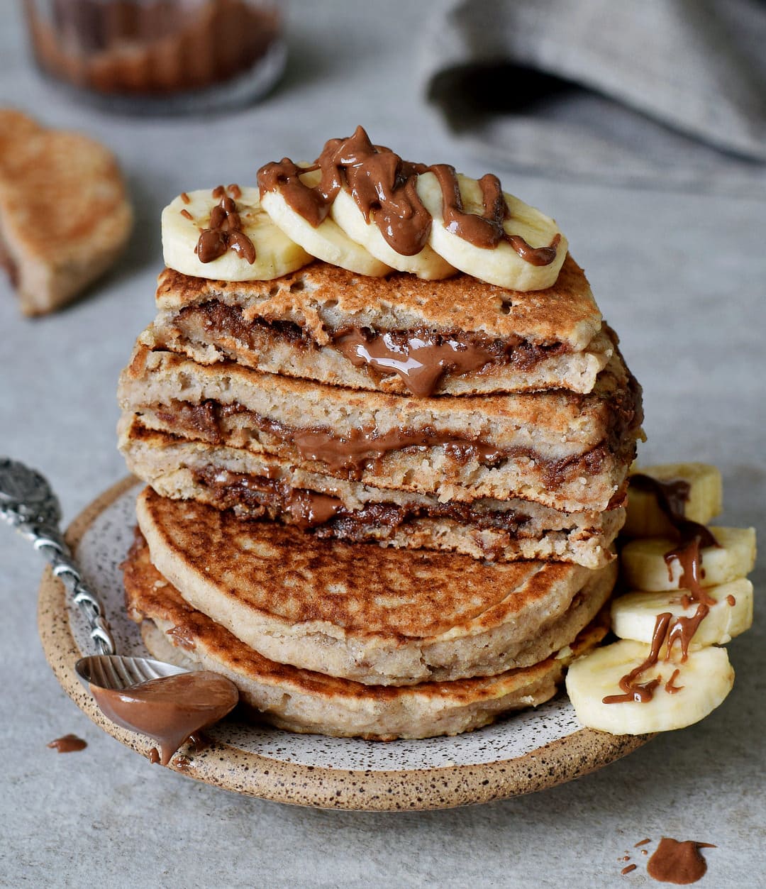 vegan gluten-free chocolate stuffed pancakes with banana slices