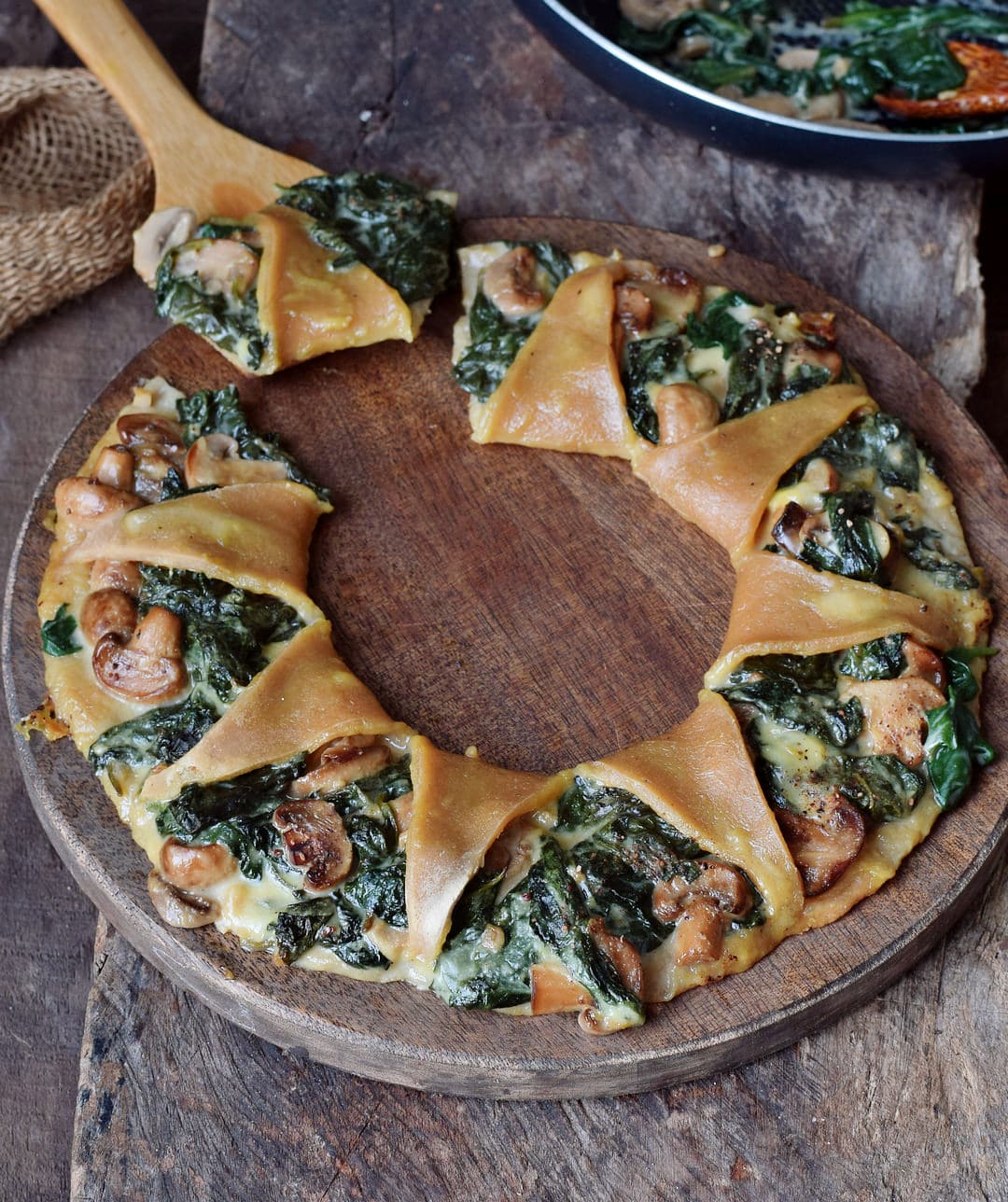 Gluten-free dough with spinach mushrooms and vegan cheese