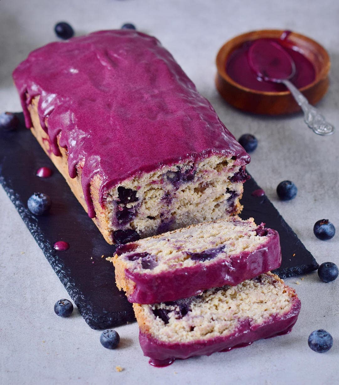 sliced banana bread with blueberries