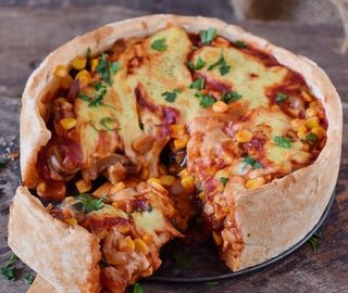 Vegan deep dish pizza recipe with veggies and vegan cheese