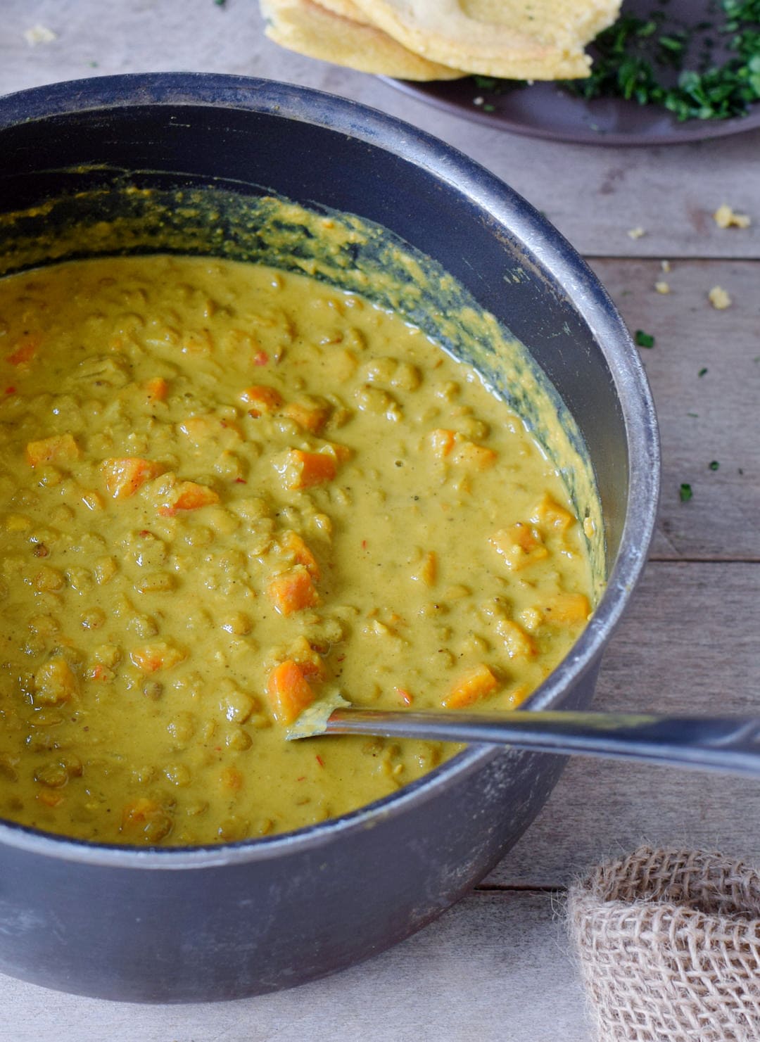 1-pot lentil dal with carrots in a pot close-up