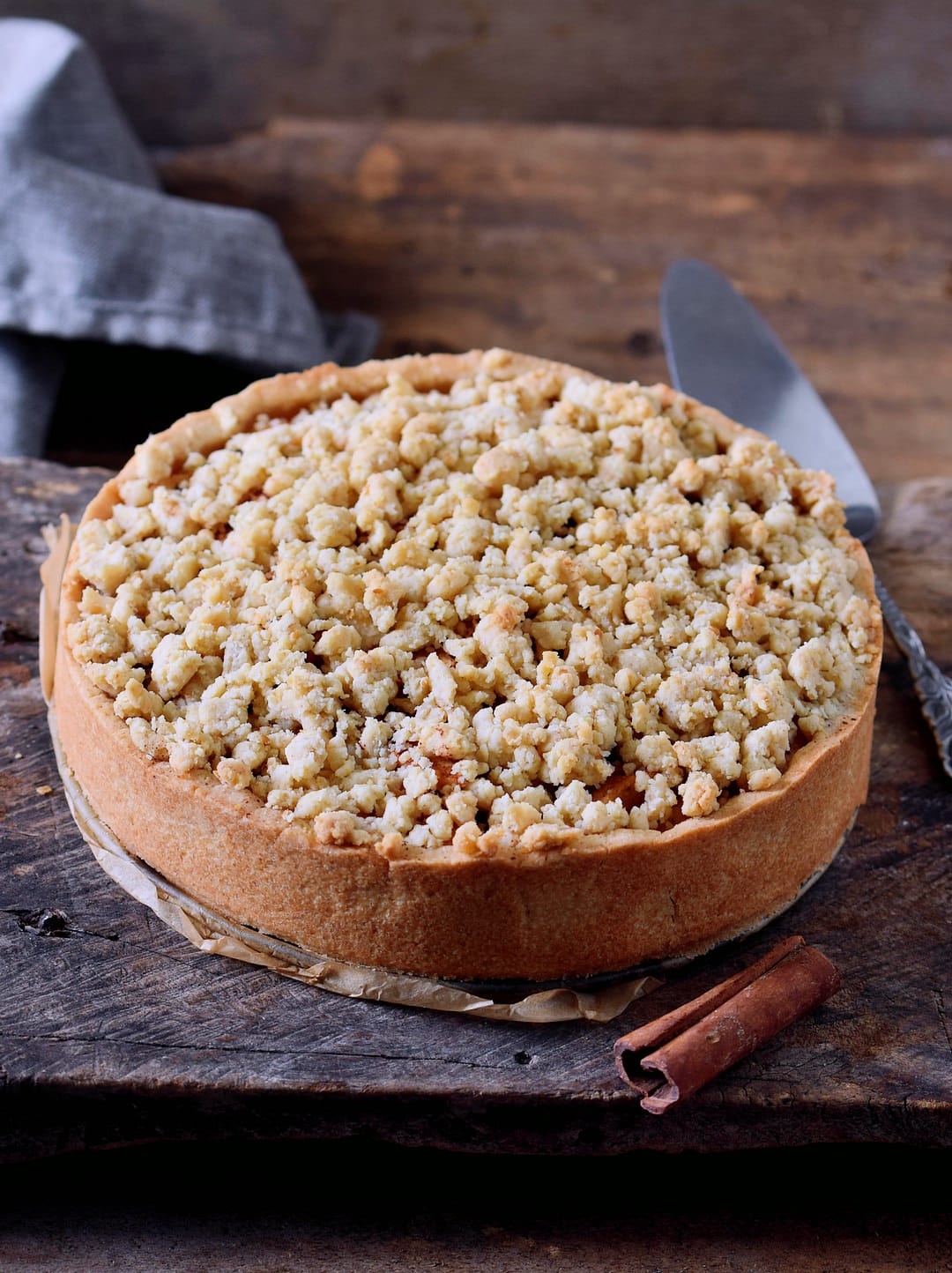 Apple crumble cake with streusel in a pan uncut