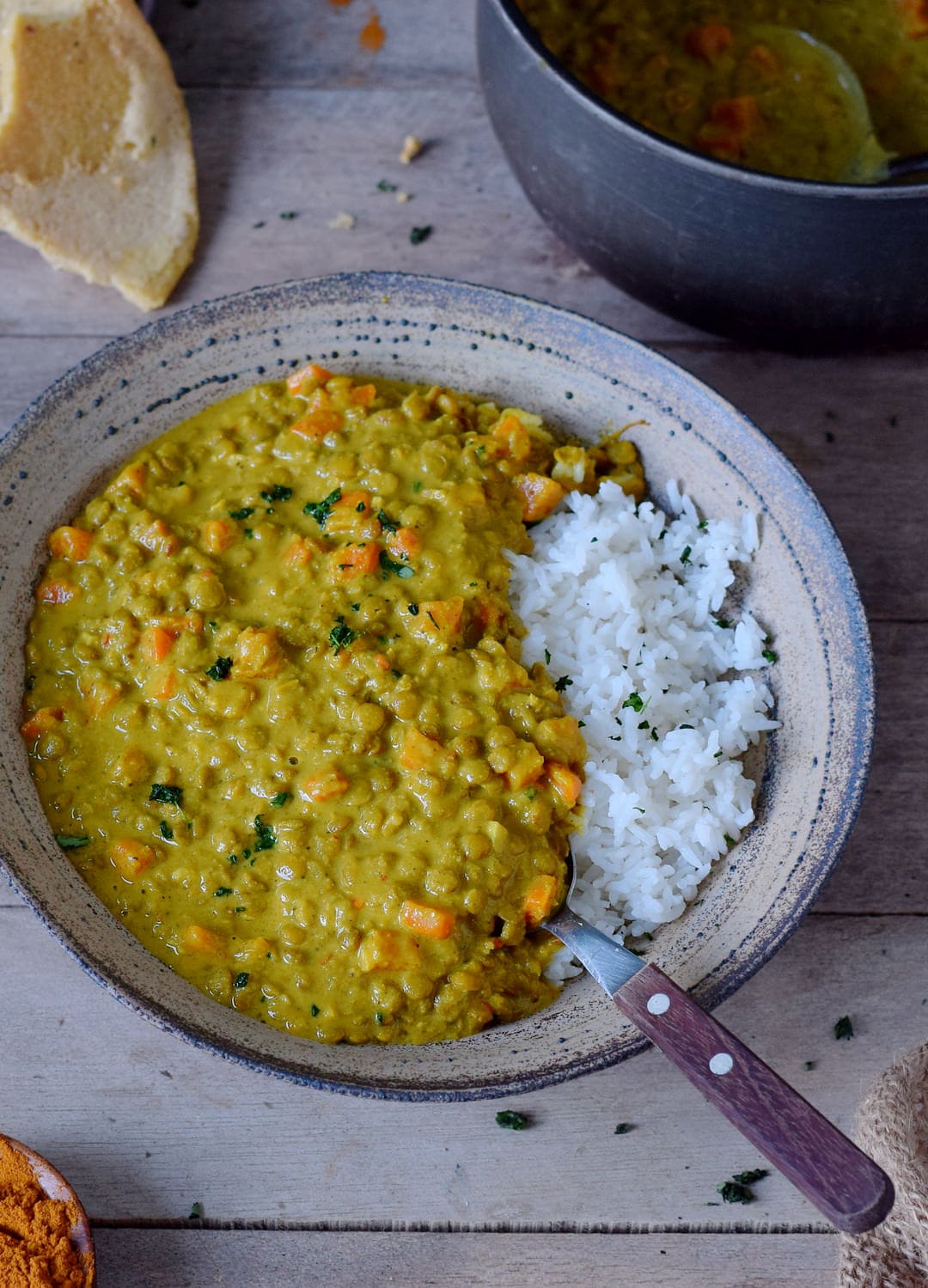 easy lentil dal with rice on a plate with naan