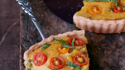 gluten-free vegan quiche (soy free) with a piece in the front