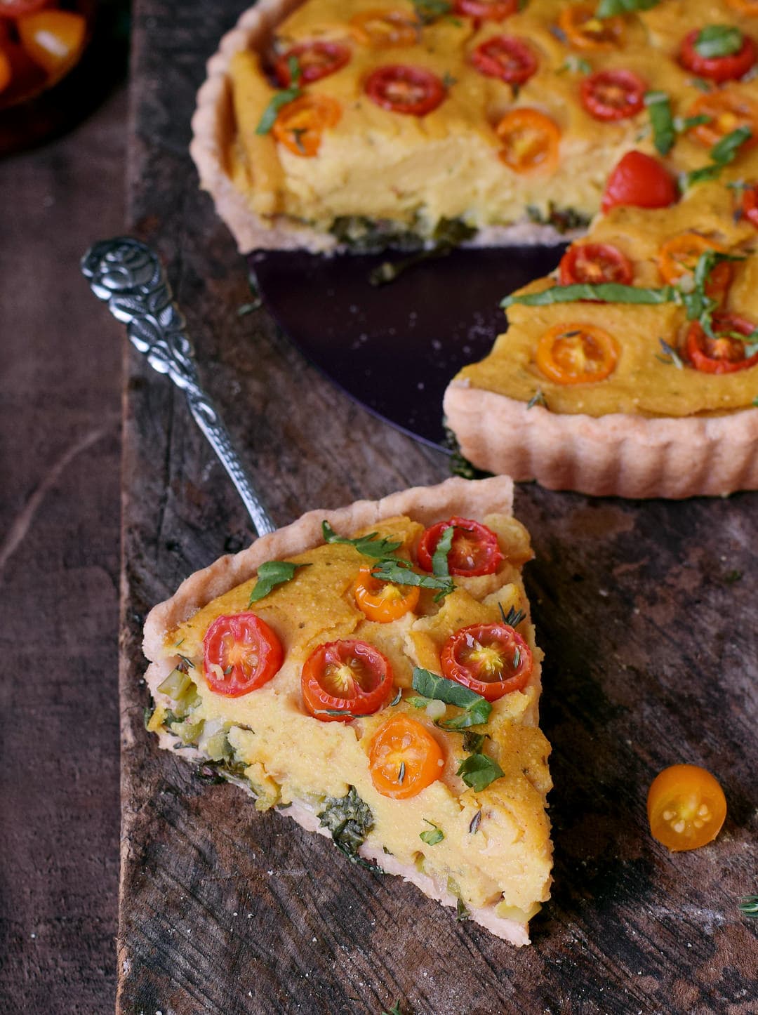 gluten-free vegan quiche (soy free) with a piece in the front