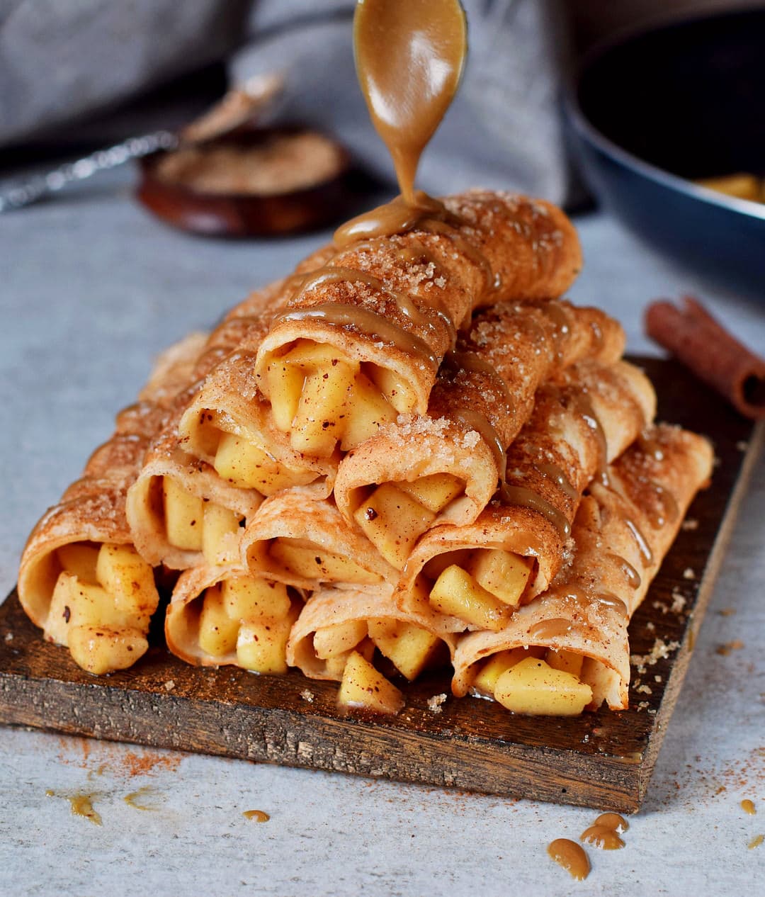 10 apple cinnamon crepes drizzled with homemade caramel sauce