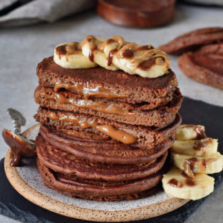 Caramel chocolate pancakes with banana slices vegan recipe