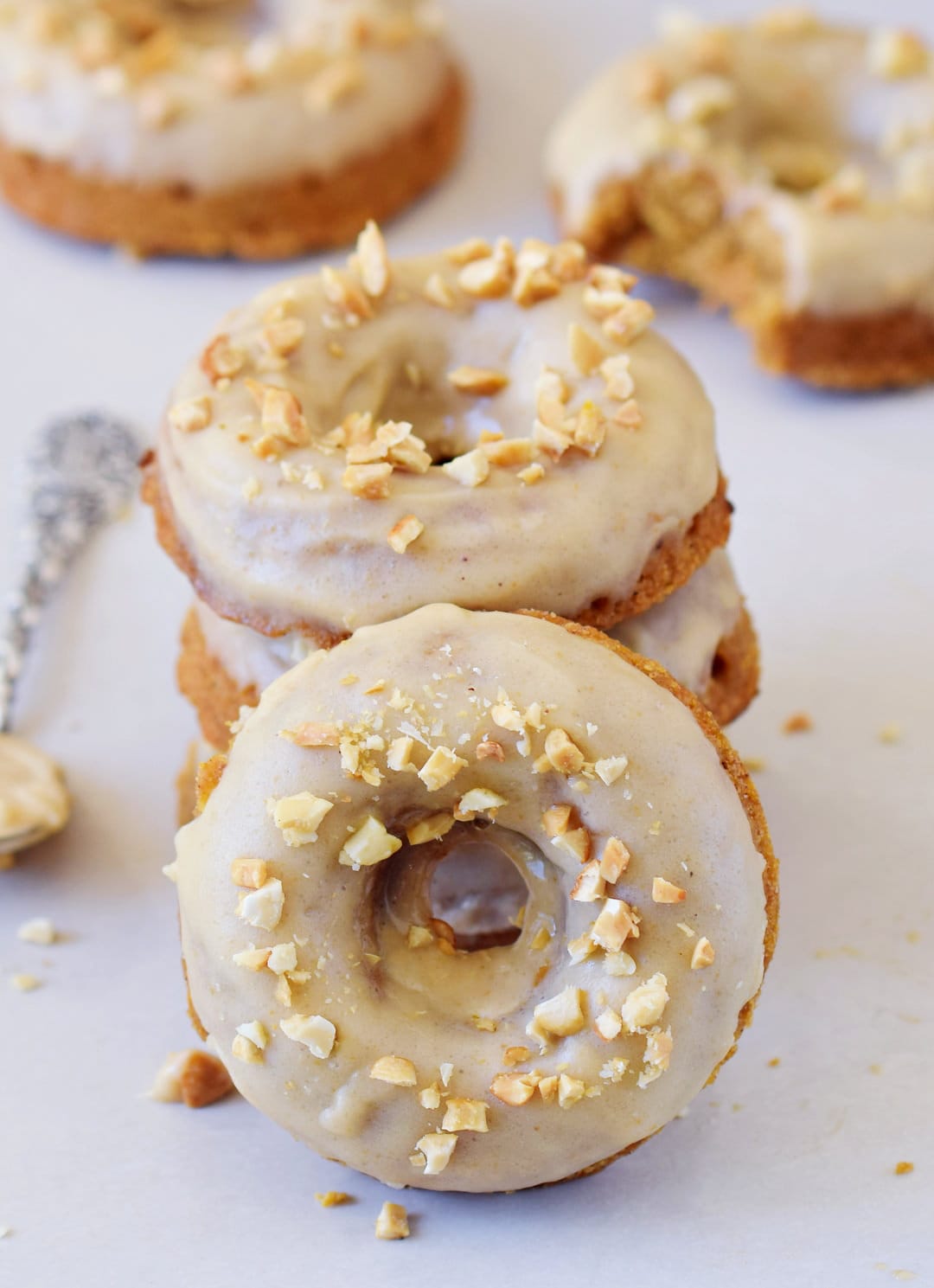 healthy vegan carrot cake donuts with gingerbread flavor and frosting gluten-free
