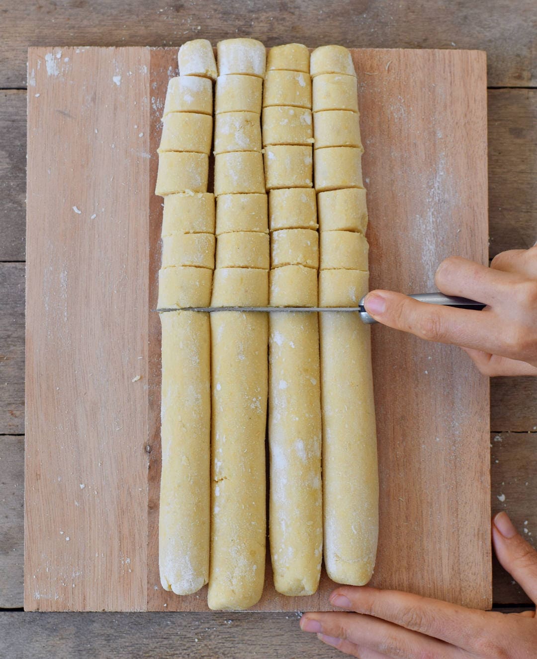 Cutting the dough for Italian potato dumplings