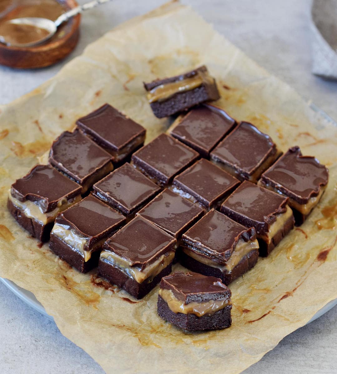 side view of brownie bites with caramel-layer