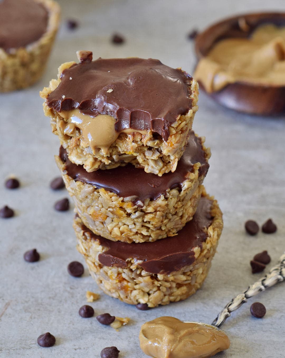 stack of no-bake granola dessert filled with sunflower seed butter and chocolate