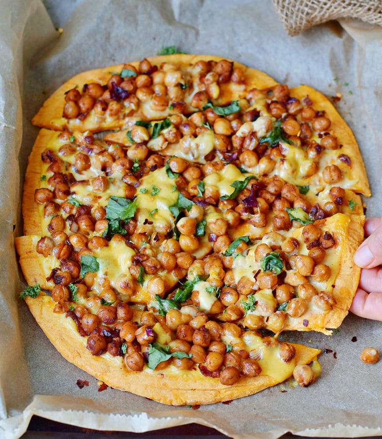 Gluten-free chickpea pizza with a sweet potato crust