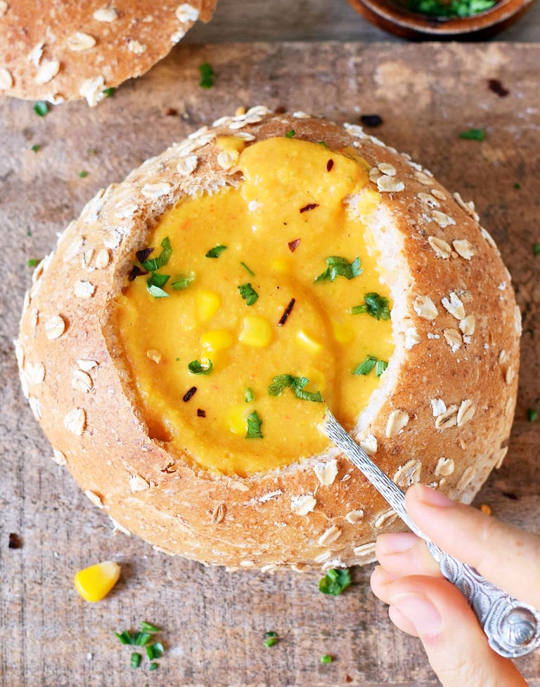 creamy vegetarian soup served in a bread bowl
