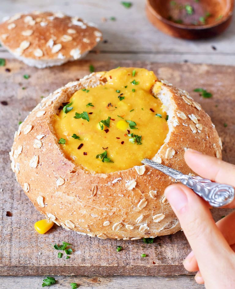 easy vegan corn chowder soup recipe in a bread bowl