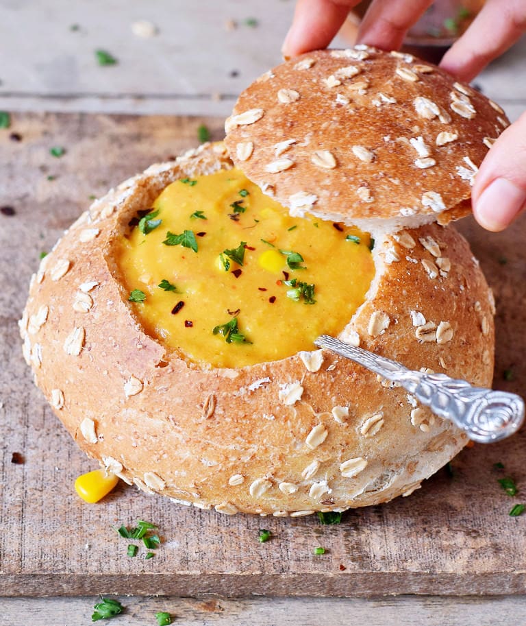 healthy vegan corn chowder soup recipe in a bread bowl