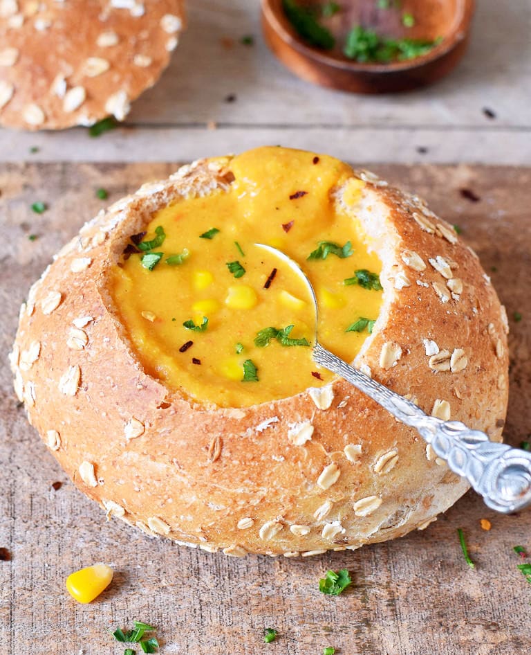 rich vegan corn chowder recipe in a bread bowl