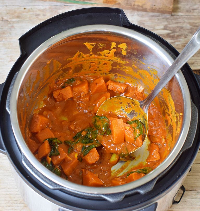 Leftovers of vegan curry with sweet potatoes and spinach in the Instant Pot