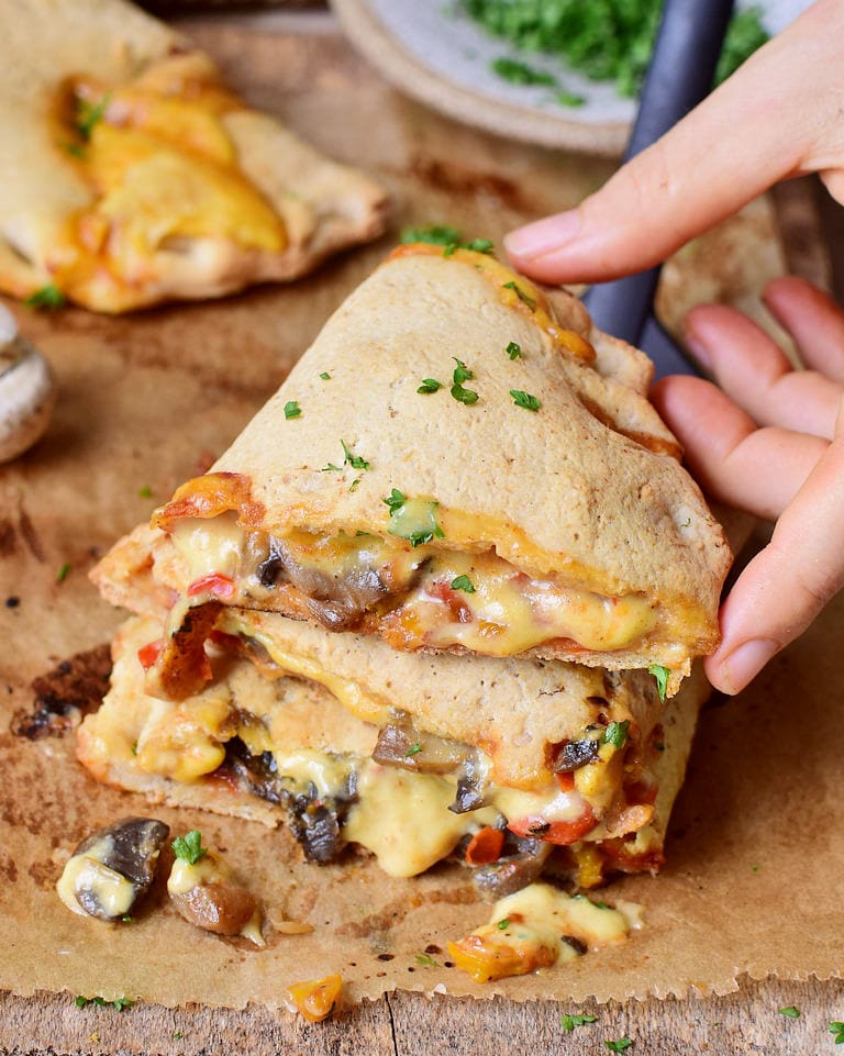 easy calzone pocket with mushrooms peppers and vegan cheese