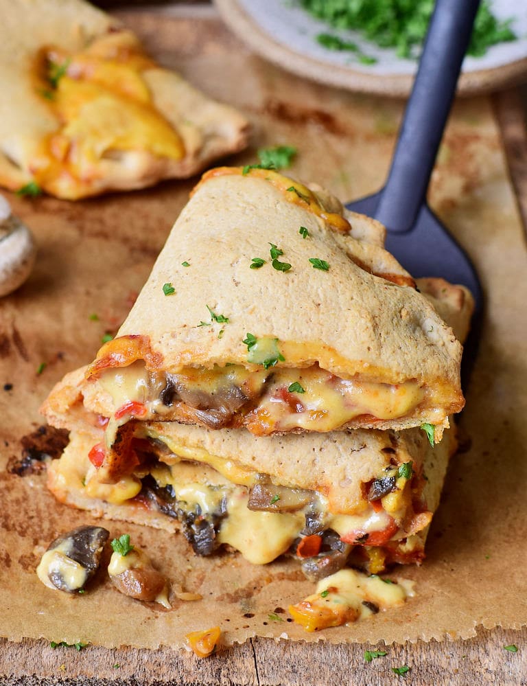 simple calzone pocket with mushrooms peppers and vegan cheese