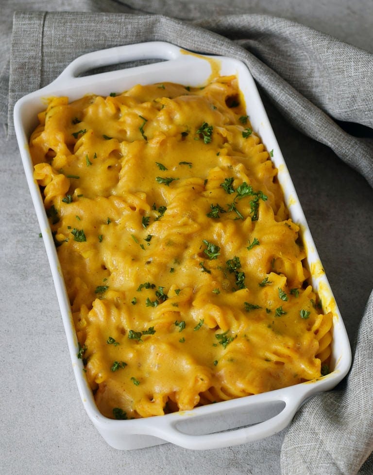 baked pumpkin pasta in a white pan