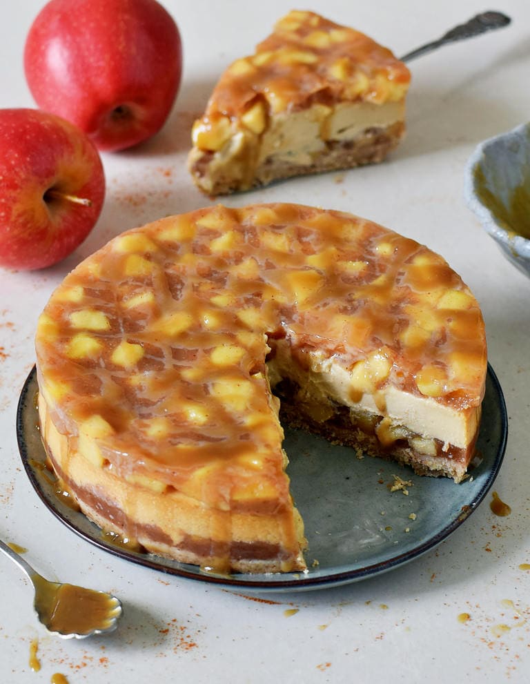 vegan cake with apples and a piece cut out