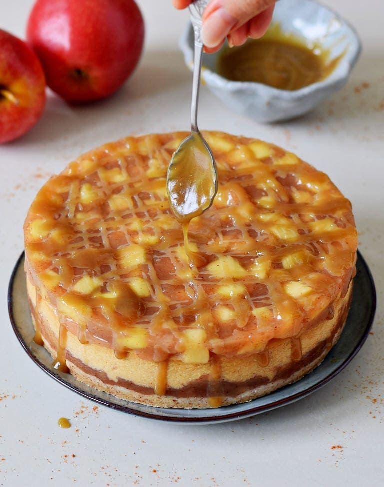 whole apple cheesecake pie with caramel drizzle