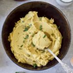 homemade vegan ricotta cheese in a brown bowl