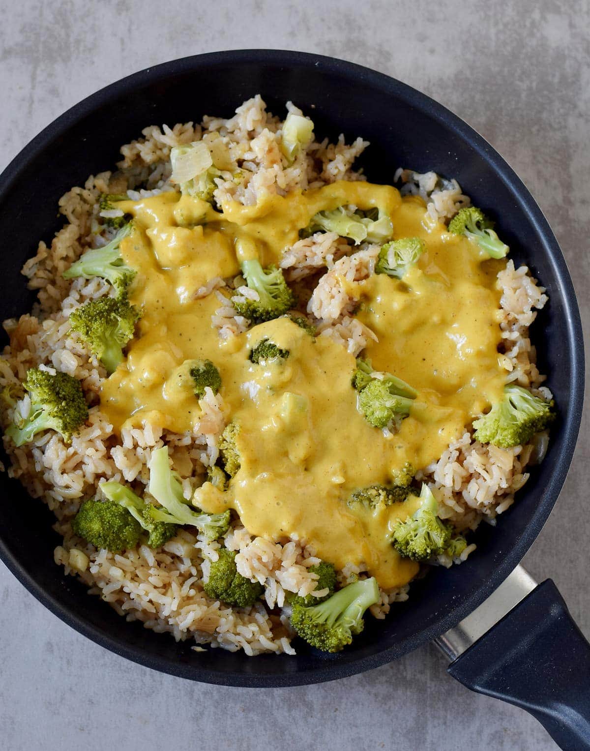 cooked arborio rice with broccoli and cheese