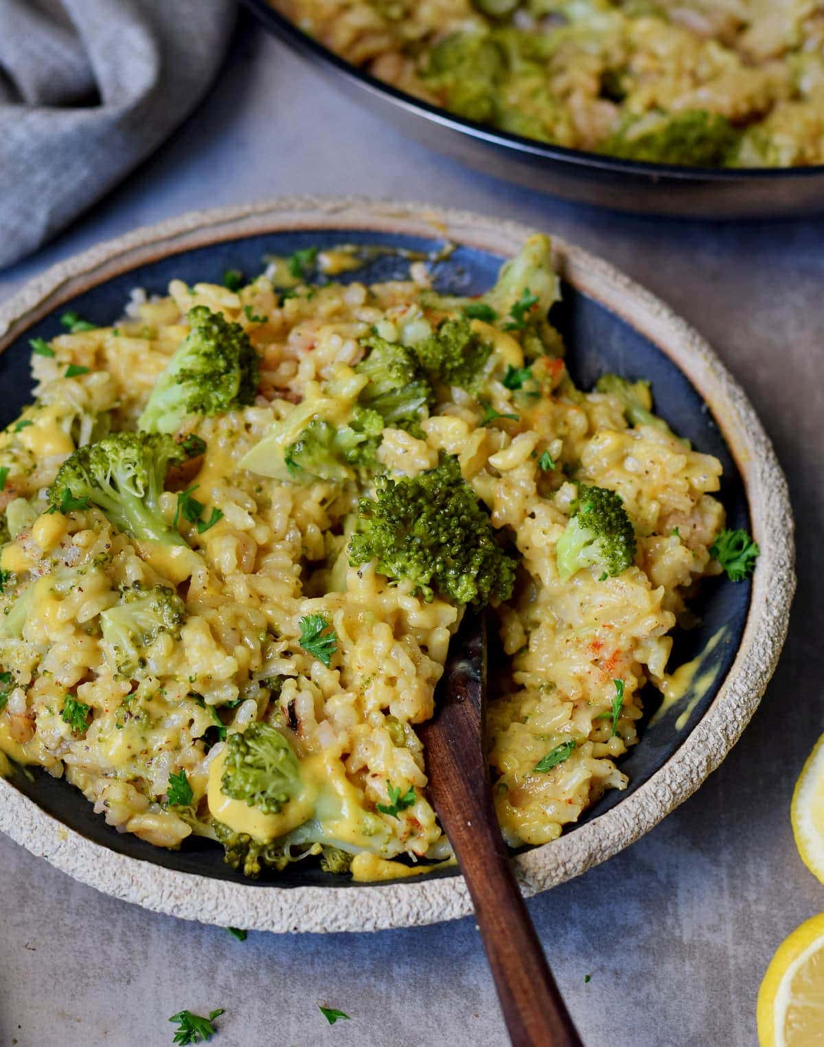 the best vegan risotto with broccoli and cheese on a plate
