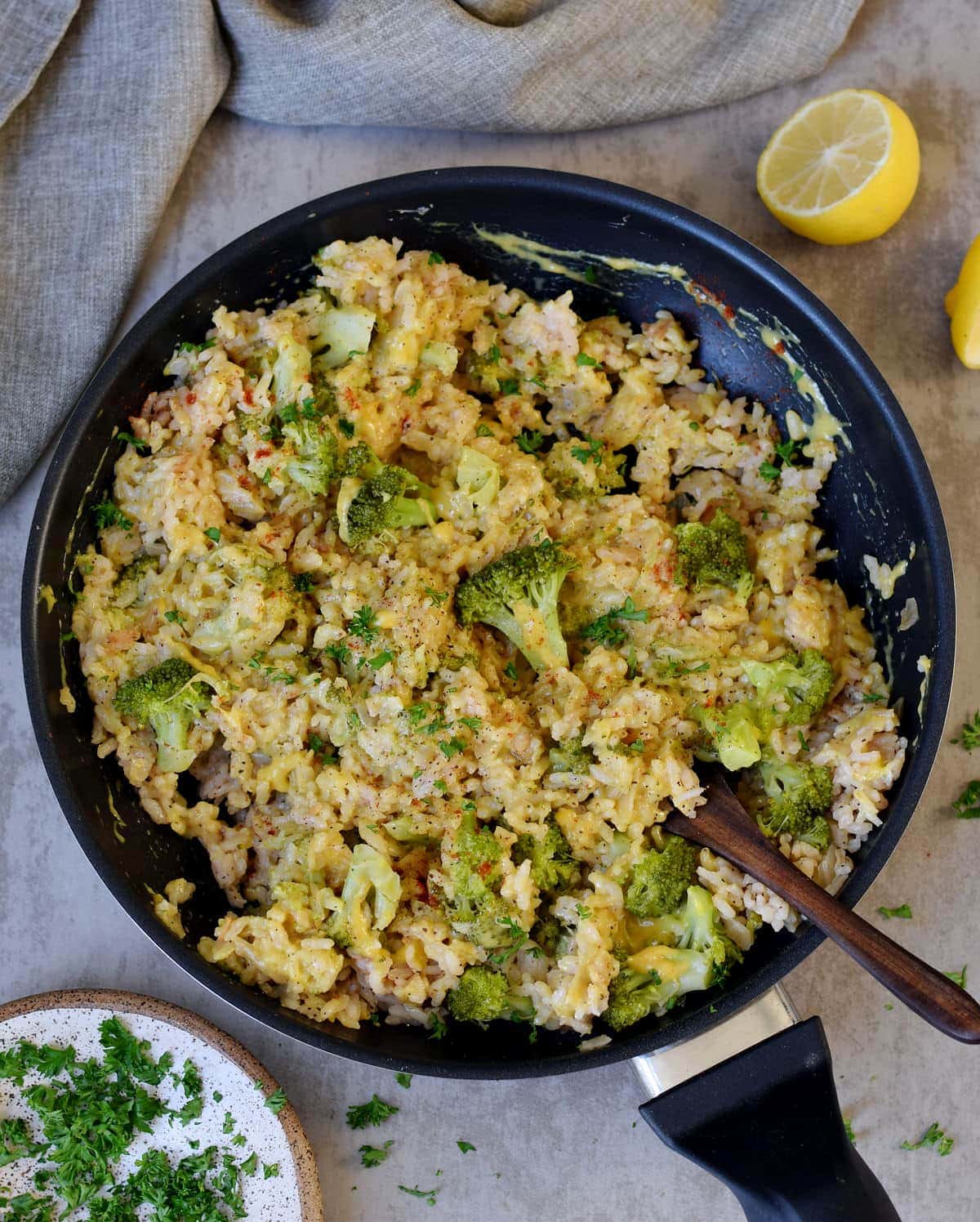 vegan risotto with broccoli and cheese in a pan