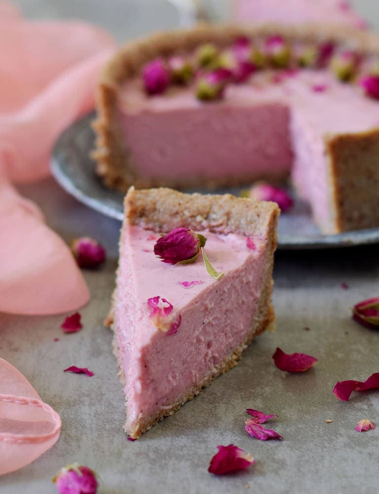 piece of pink vegan gluten-free cheesecake