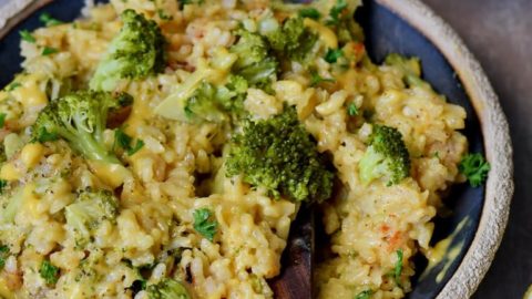 the best vegan risotto with broccoli and cheese on a plate