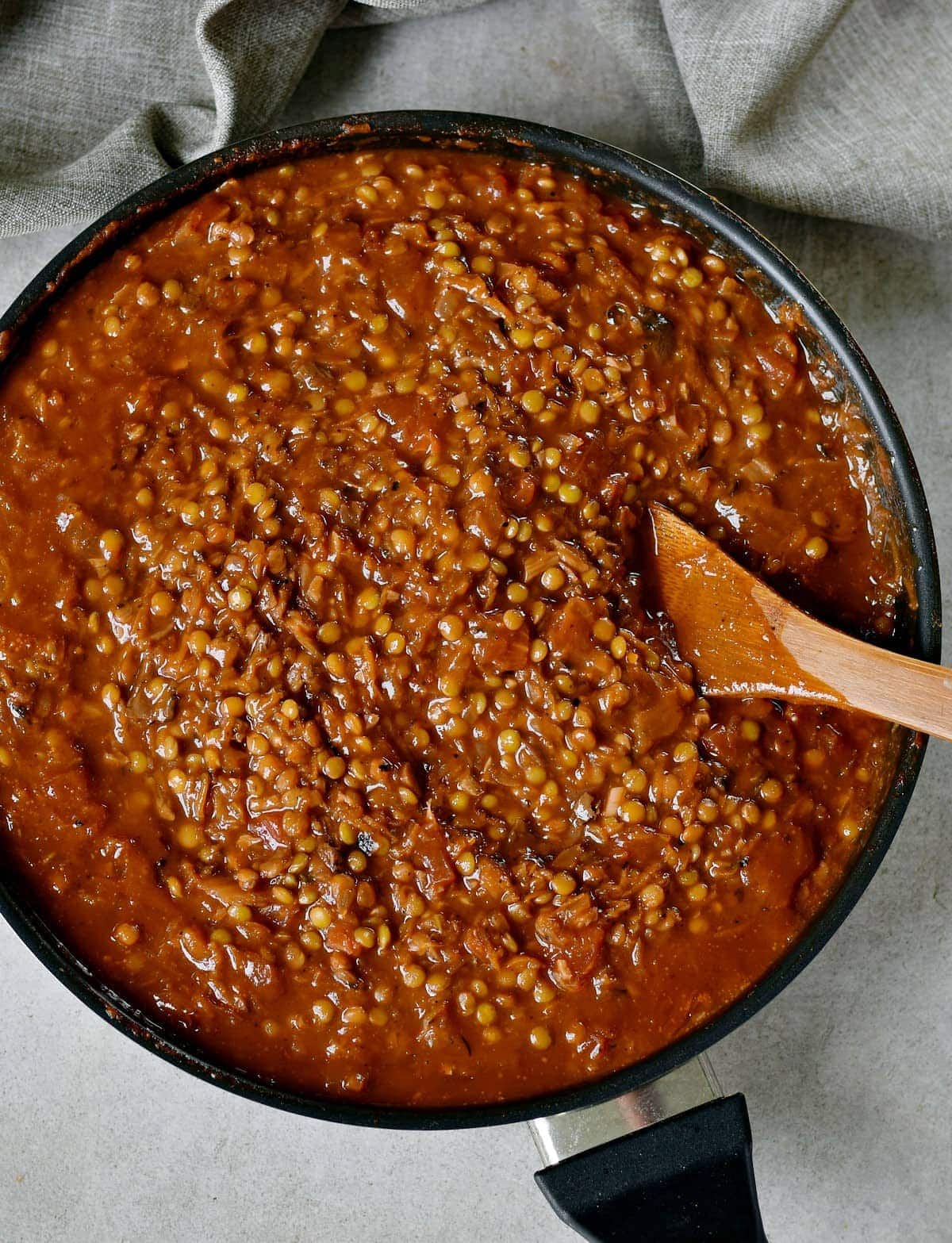 vegetarian lentil sauce in a black pan