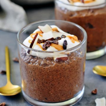 chocolate keto chia pudding topped with coconut whip