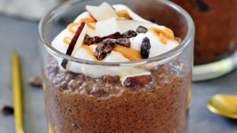chocolate keto chia pudding topped with coconut whip