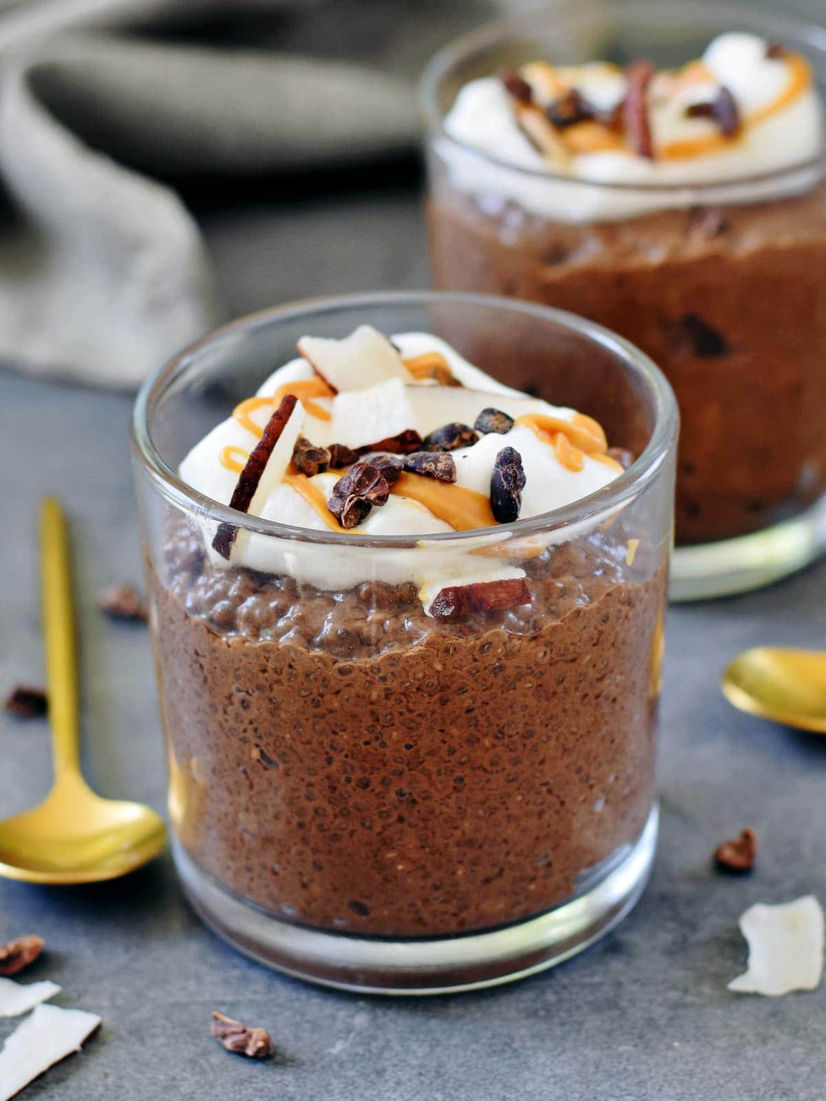 chocolate chia pudding topped with coconut whip