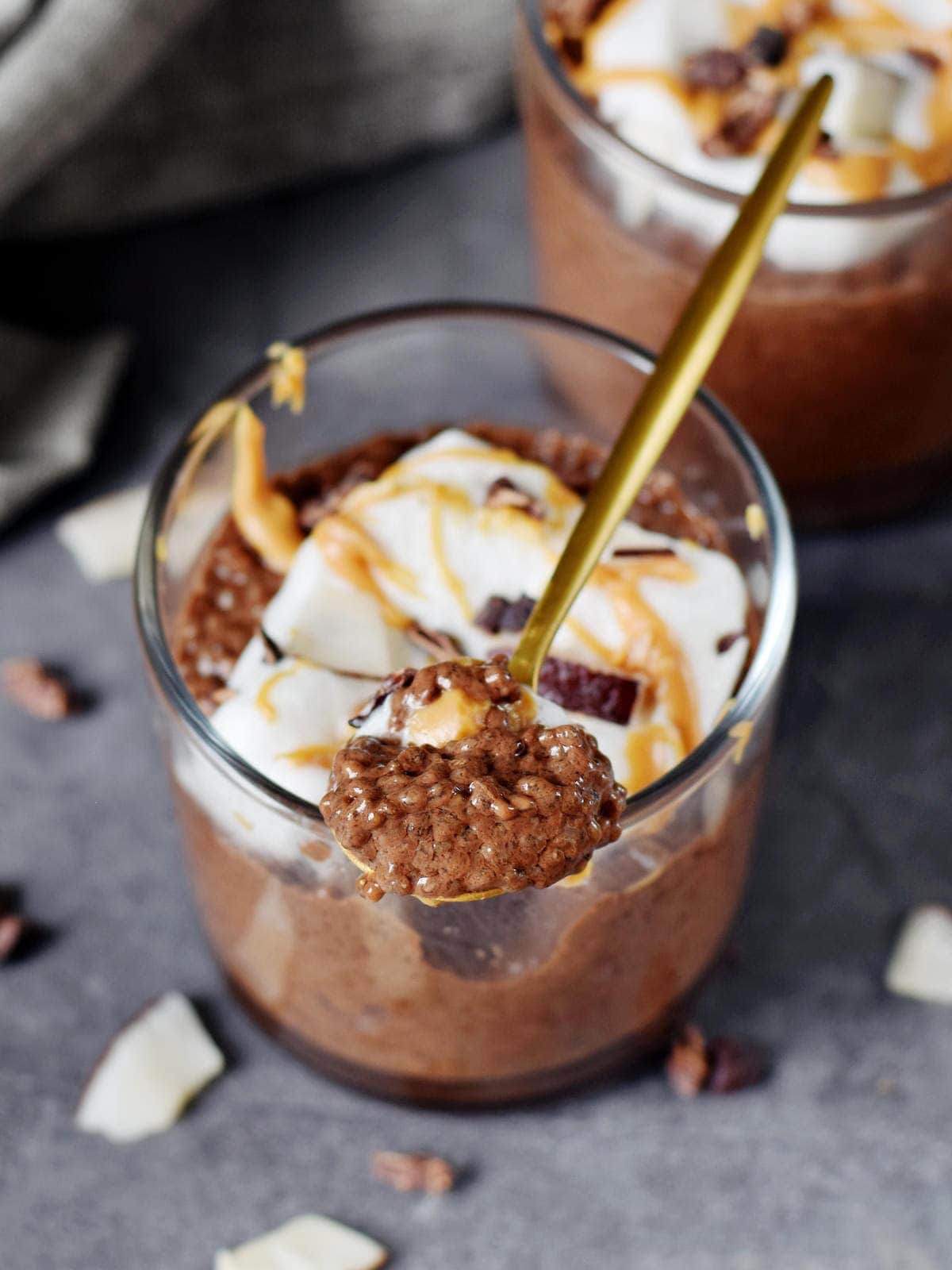 healthy breakfast chocolate pudding in a jar with a spoon