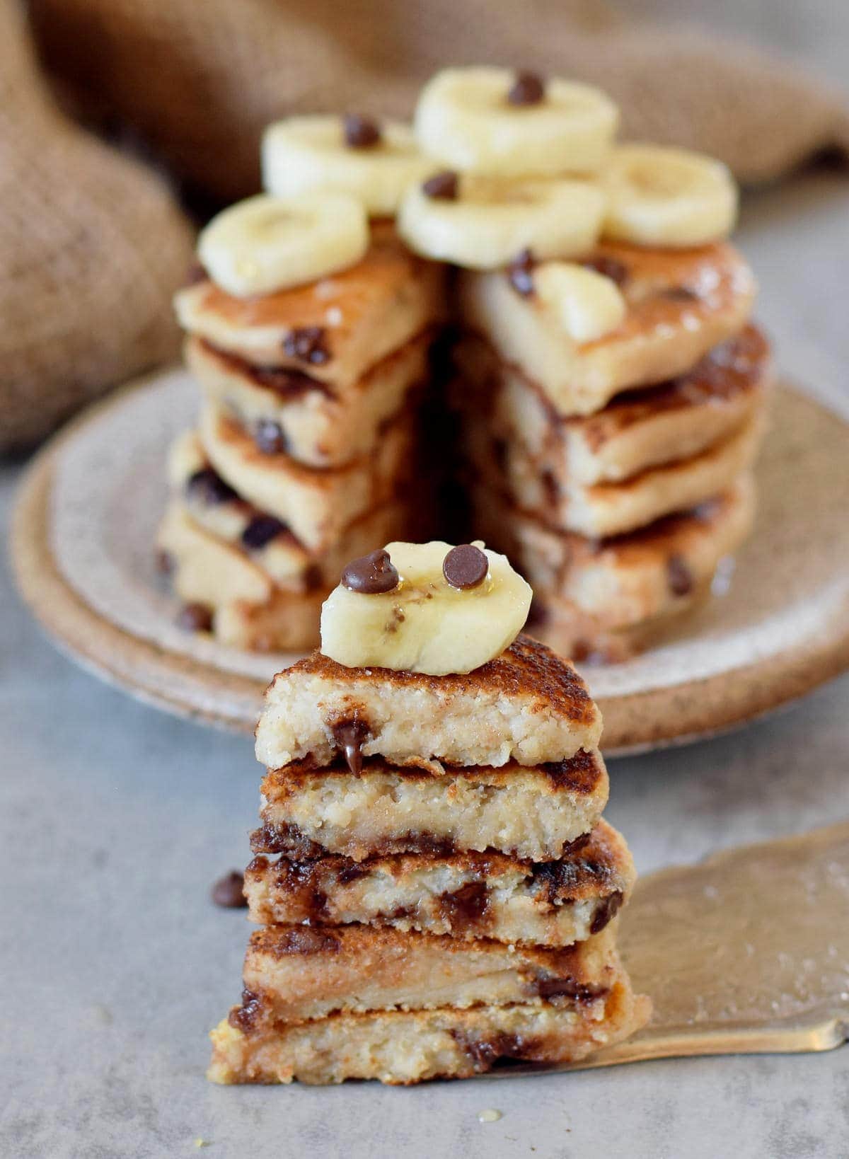 mini stack of banana oat pancakes with chocolate
