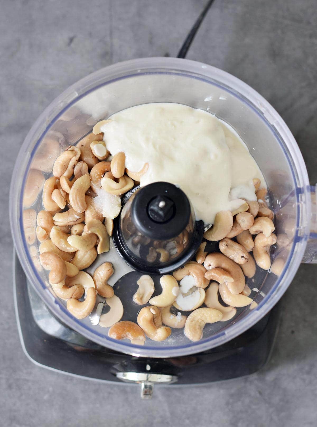 https://elavegan.com/wp-content/uploads/2020/06/all-ingredients-for-dairy-free-sour-cream-in-a-food-processor.jpg