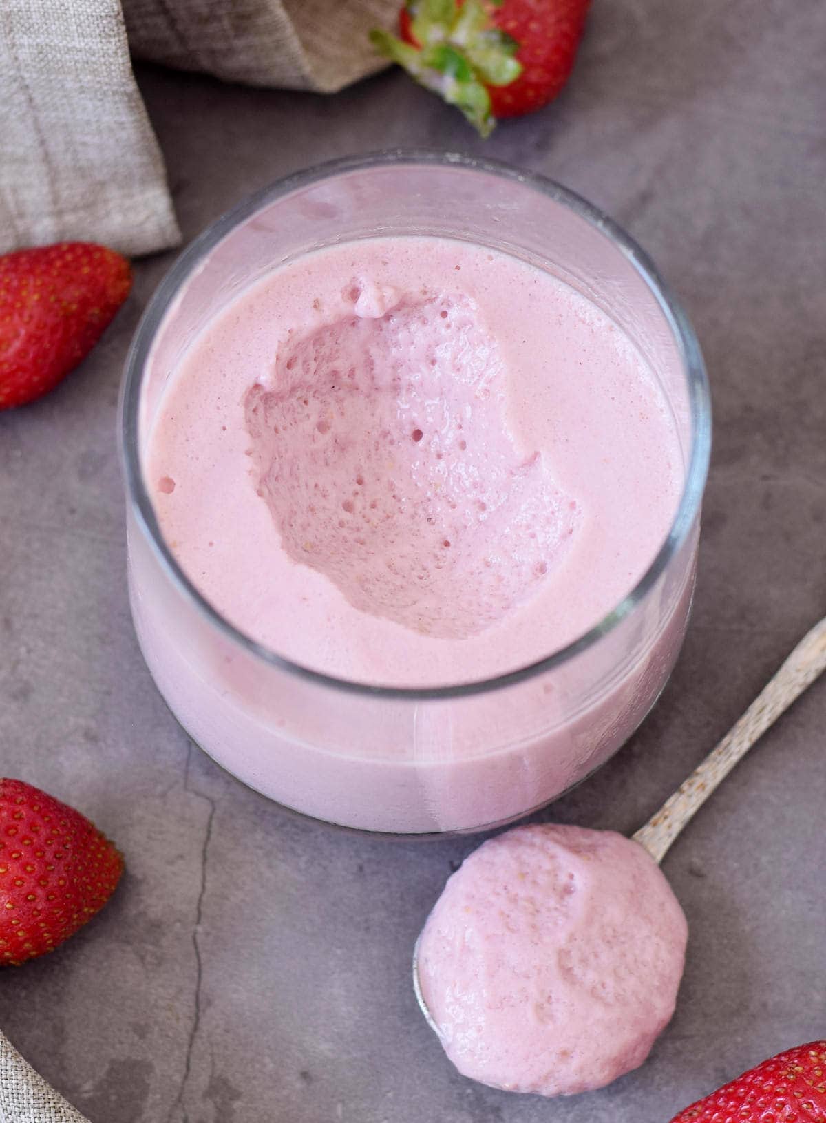 strawberry mousse in a jar with spoon