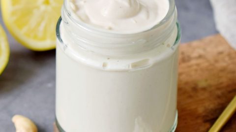 vegan sour cream in a jar with cashews and lemon