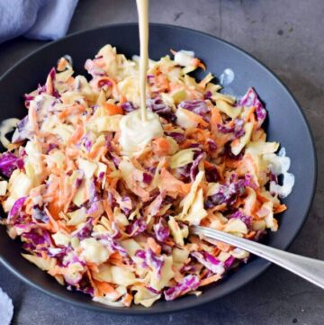 cropped-pouring-dairy-free-sour-cream-over-keto-coleslaw.jpg